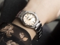 Preview: elegant sportliche damenuhren mit perlmutt diamantzifferblatt